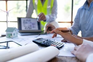 team-plans-new-home-construction-project-at-office
